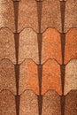 The texture of brown shingles to protect the surface of the roof of the house from precipitation. Vertical image Royalty Free Stock Photo
