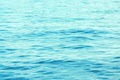 Background texture of a calm surface of the turquoise sea