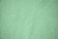 Background, texture, colored green fabric textile matt