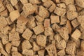 Background texture of crackers. heap small pieces dried bread. crumbs of bread croutons