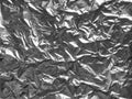 Background texture of crumpled  aluminum leaf foil. Royalty Free Stock Photo