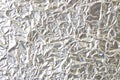 Background texture of crumpled foil sheet . Abstract silver back Royalty Free Stock Photo