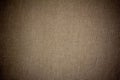 Background texture of dark grey canvas fabric with vignette. Royalty Free Stock Photo