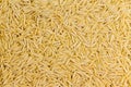 Background texture of dried Italian orzo pasta