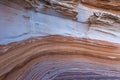 Background texture of eroded sandstone with red layered patterns and curves Royalty Free Stock Photo