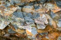 Background texture of a gray brown stone on the rock of the mountain discovered during archaeological excavations as a monument t Royalty Free Stock Photo