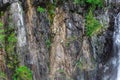 Background texture of a gray brown stone on the rock of the mountain discovered during archaeological excavations as a monument to