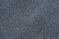 Background texture. Gray surface made of small stones, roofing felt. Copy space