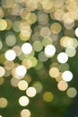 Background texture of green colored Christmas decoration blurred lights Royalty Free Stock Photo