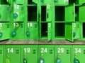 Background texture: green lockers in the locker room. Lockers in a public locker room. Luggage storage in the store Royalty Free Stock Photo