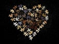 Background texture: heart shape on puzzle paper background. Puzzle in the details in the form of a mosaic. Concept: love, Royalty Free Stock Photo