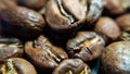 Background or texture of large coffee roasted beans. Macro. Arabica coffee. Industry. Royalty Free Stock Photo