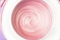 background texture liquid wax for depilation of pink color. The concept of depilation,