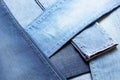 Background and texture of lot of different blue jeans. Royalty Free Stock Photo