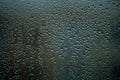 Background or texture. It is a lot of small a rain drops on window glass. Rainy day of spring. Royalty Free Stock Photo