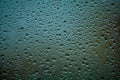 Background or texture. It is a lot of small a rain drops on window glass. Rainy day of spring. Royalty Free Stock Photo