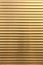 The background and texture of metal blinds golden color