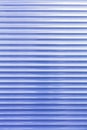 The background and texture of the metal blinds are light blue in color Royalty Free Stock Photo