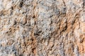Background and texture of mountain layers and cracks in sedimentary rock on cliff face. Cliff of rock mountain. Royalty Free Stock Photo