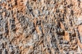 Background and texture of mountain layers and cracks in sedimentary rock on cliff face. Cliff of rock mountain. Royalty Free Stock Photo