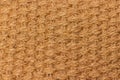 Background texture of natural material matting, cannabis hemp fiber. Material woven from natural hemp. Texture yellow brown beige