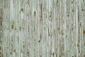 Background texture of old gray green painted wooden lining boards wall. Vertical wooden texture. Toned image Royalty Free Stock Photo