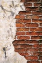 Background texture of old red brick house wall with gray cement. Close up. Copy space Royalty Free Stock Photo