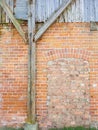 Background texture old red brick wall with broken wood of half timbered house Royalty Free Stock Photo