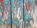 Background texture old wooden door with brown green broken paint Royalty Free Stock Photo