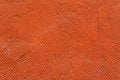 Background, texture: orange, deliberately coarse plastered wall of a building closeup Royalty Free Stock Photo