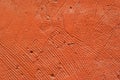 Background, texture: orange roughly plastered wall Royalty Free Stock Photo