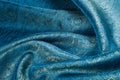 Background texture, pattern. Blue paisley silk chiffon mod fabric by the yard. Crinkled, flowy, soft, very light, Royalty Free Stock Photo