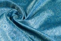 Background texture, pattern. Blue paisley silk chiffon mod fabric by the yard. Crinkled, flowy, soft, very light,