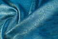 Background texture, pattern. Blue paisley silk chiffon mod fabric by the yard. Crinkled, flowy, soft, very light, Royalty Free Stock Photo