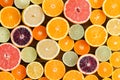 Background texture of mixed cut citrus fruit