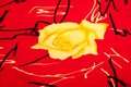 Background texture, pattern. Red silk fabric Yellow roses. Print Royalty Free Stock Photo