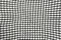 Background texture, pattern. Scarf wool like Yasser Arafat. The Palestinian keffiyeh is a gender-neutral checkered black and white Royalty Free Stock Photo