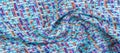 Background texture, pattern. Winter fabric, warm. big braided thread. Blue-red yellow threads. This photo will make your design