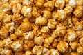 Background texture of popcorn in caramel glaze. Close up Royalty Free Stock Photo