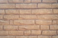 Background texture of stone - brick decoration of the facade of the building Royalty Free Stock Photo