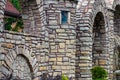 background texture stone fence.Gate near the house Royalty Free Stock Photo