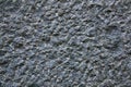 Background, texture - the surface of a roughly hewn granite block