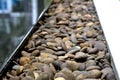 Background texture of swimming pool/garden pile of pebbles Royalty Free Stock Photo