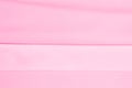 Background texture template. silk fabric is dense, pink. Teanting with texture, Shantung has a satisfactorily nubby arm paired wi Royalty Free Stock Photo