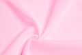 Background texture template. silk fabric is dense, pink. Teanting with texture, Shantung has a satisfactorily nubby arm paired wi Royalty Free Stock Photo