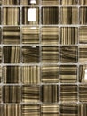 Background, texture tile wall bronze-colored, multi-colored, mosaic Royalty Free Stock Photo