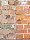 Background texture two old red weathered brick wall with damage and white light spot Royalty Free Stock Photo