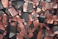 Background texture of a wall made of pieces of broken ceramic tiles