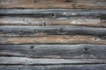 Background texture of a wall of old wooden logs and boards Royalty Free Stock Photo