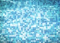 Background texture of water with  mosaic bottom caustics ripple in swimming pool. Shining sun reflection, motion of wave. Royalty Free Stock Photo